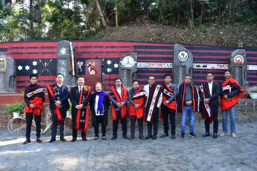 Commissioner & Secretary Anenla T Sato with members of the Ao Students' Conference after the inauguration of the Ao Students' Pillars in held in Akhoya village on January 5.
